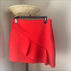 Red mini skirt with flare details